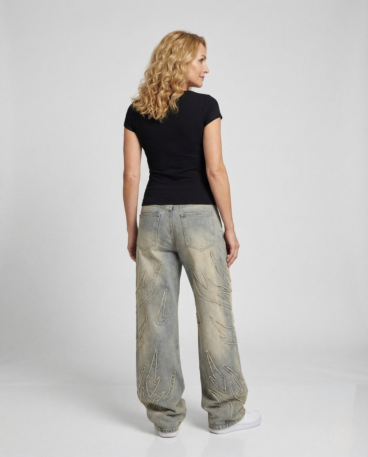 Unisex Wide-Leg Distressed Jeans with Cutouts and Fringes